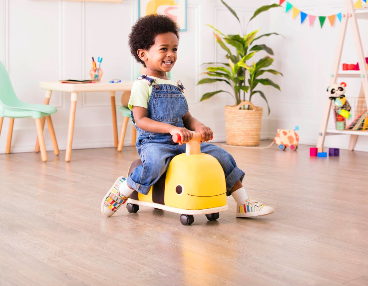 Kids wooden hot sale ride on