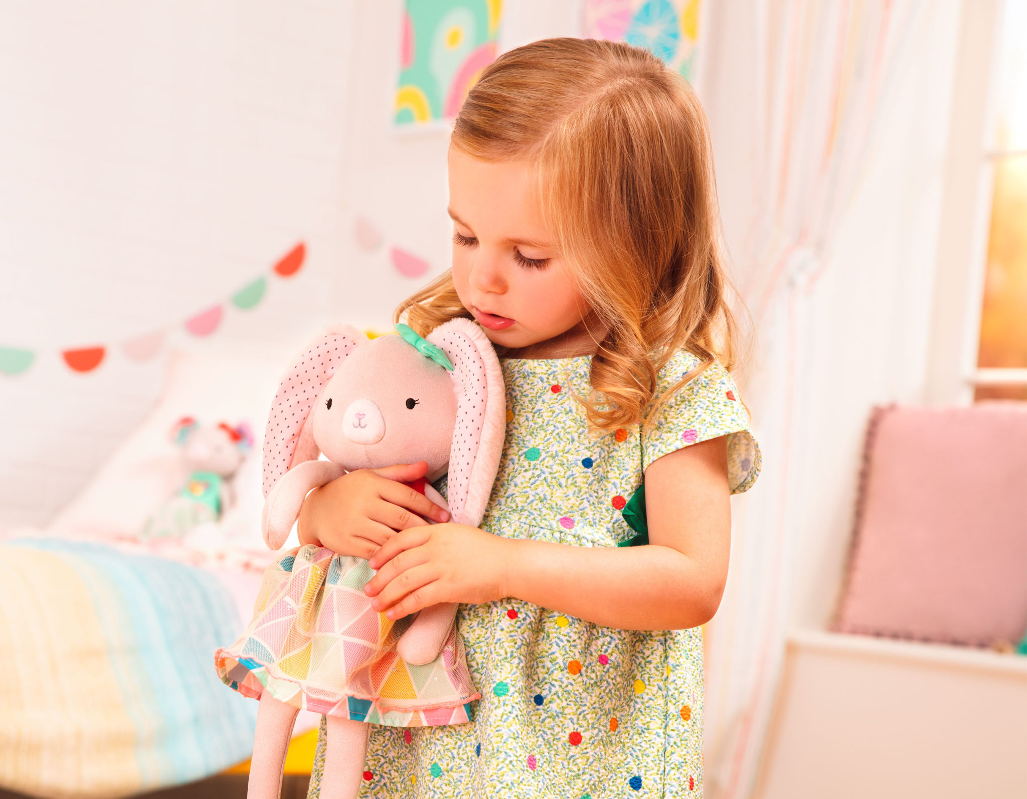 Girl and stuffed animal doll.