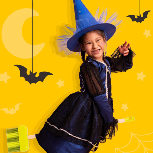 Girl in witch costume.