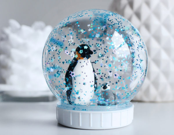 DIY snow globe with penguins.