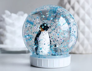 DIY snow globe with penguins.